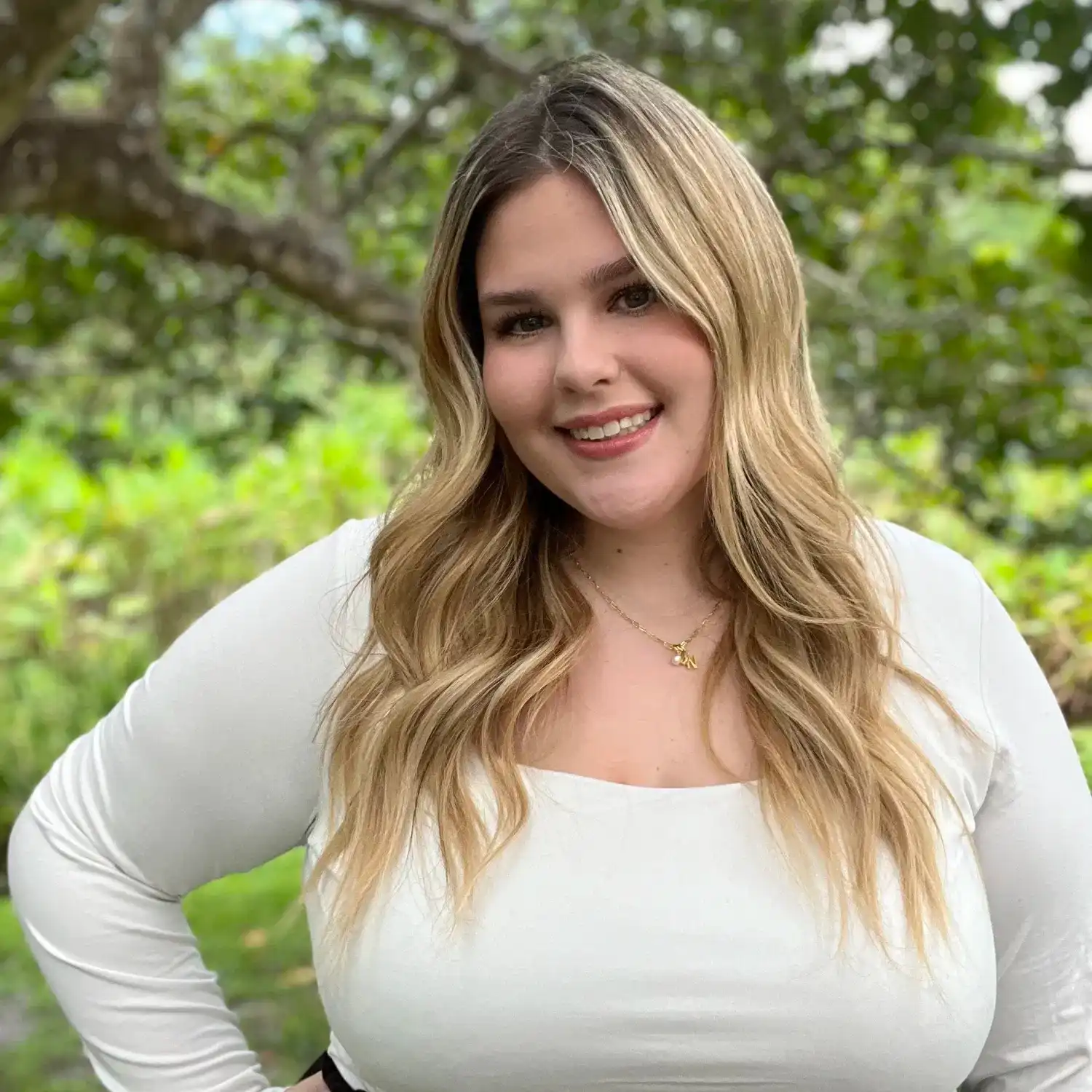 Portrait of Nora Jones, a professional stylist at Grey and Sage Salon, showcasing their expertise and style.