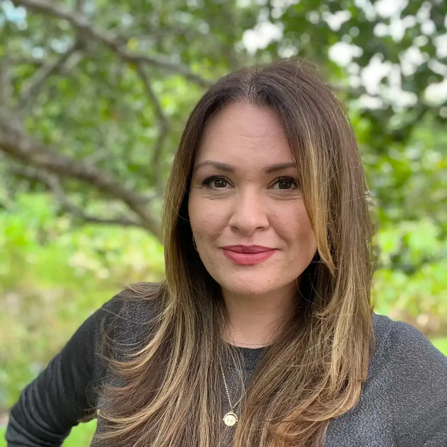 Portrait of Heather Jo Infantino, a professional stylist at Grey and Sage Salon, showcasing their expertise and style.