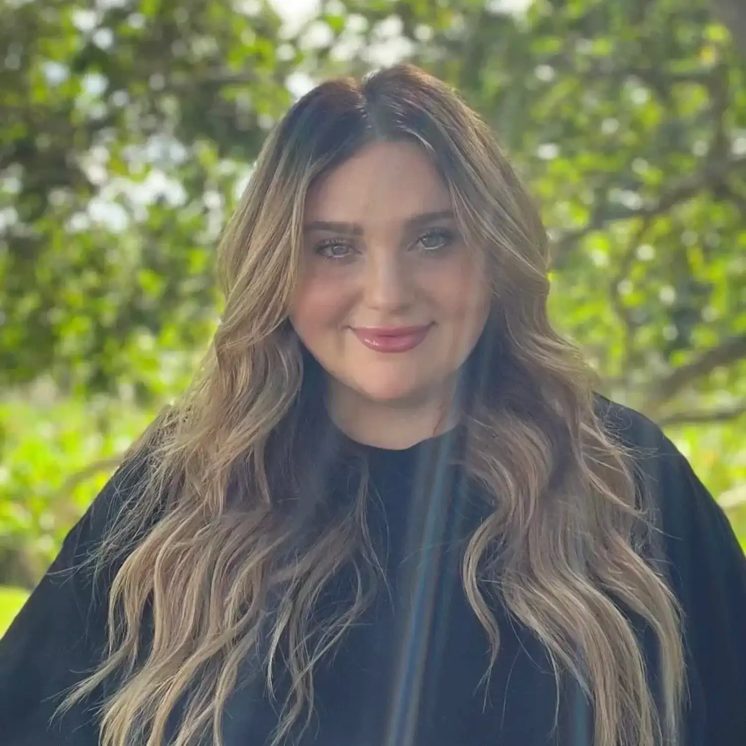 Portrait of Jessica Bono, a professional stylist at Grey and Sage Salon, showcasing their expertise and style.