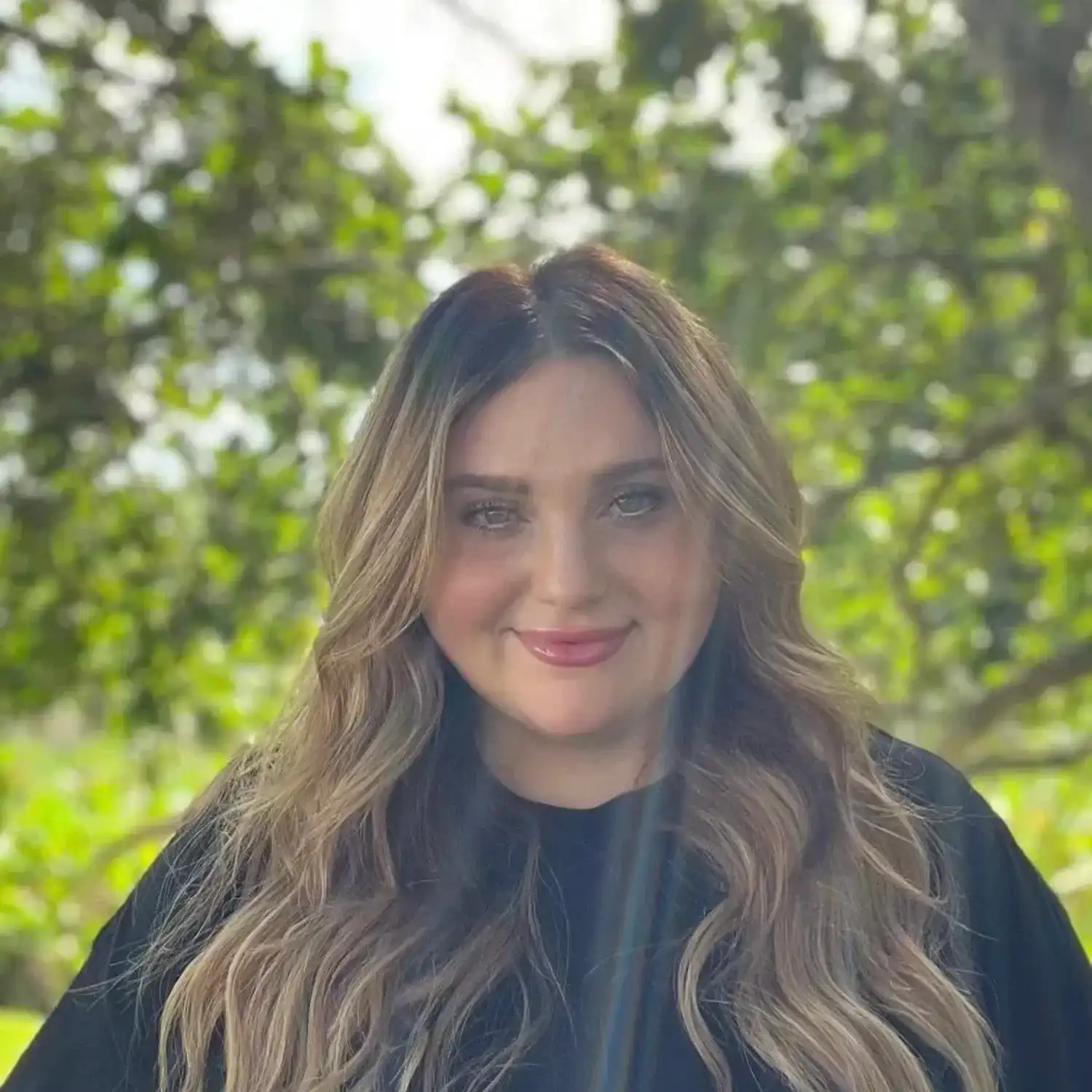 Portrait of Jessica Bono, a professional stylist at Grey and Sage Salon, showcasing their expertise and style.