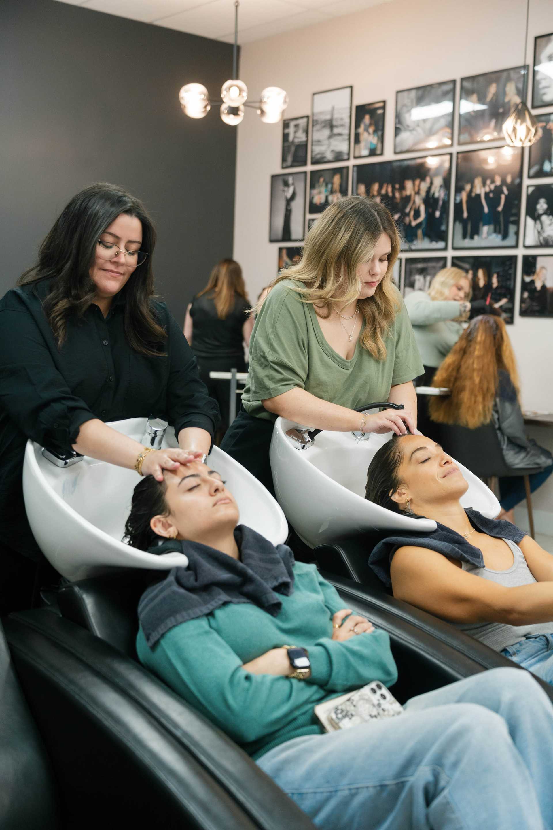 Women enjoy relaxing hair washes at a salon.