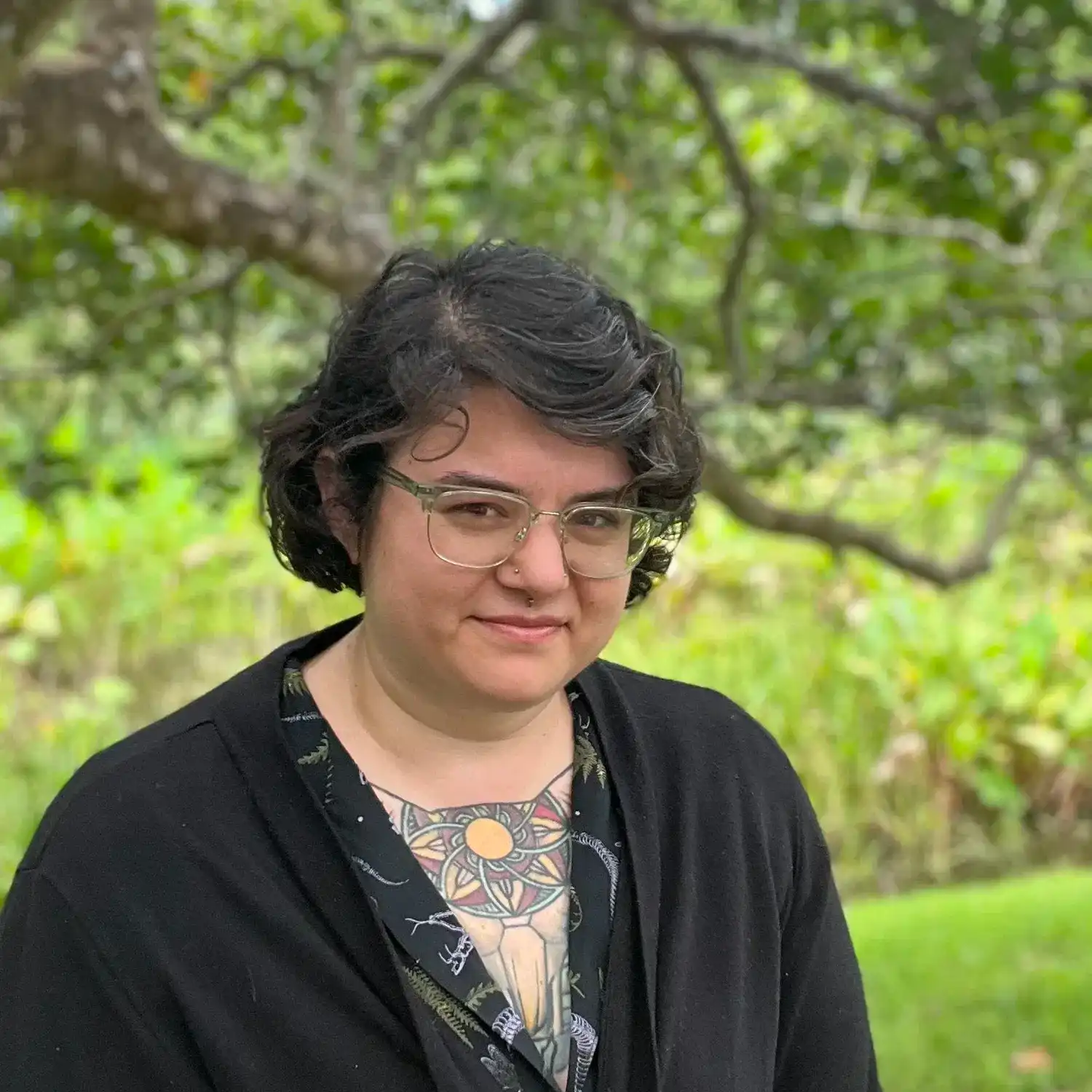 Portrait of Billie Abis, a professional stylist at Grey and Sage Salon, showcasing their expertise and style.