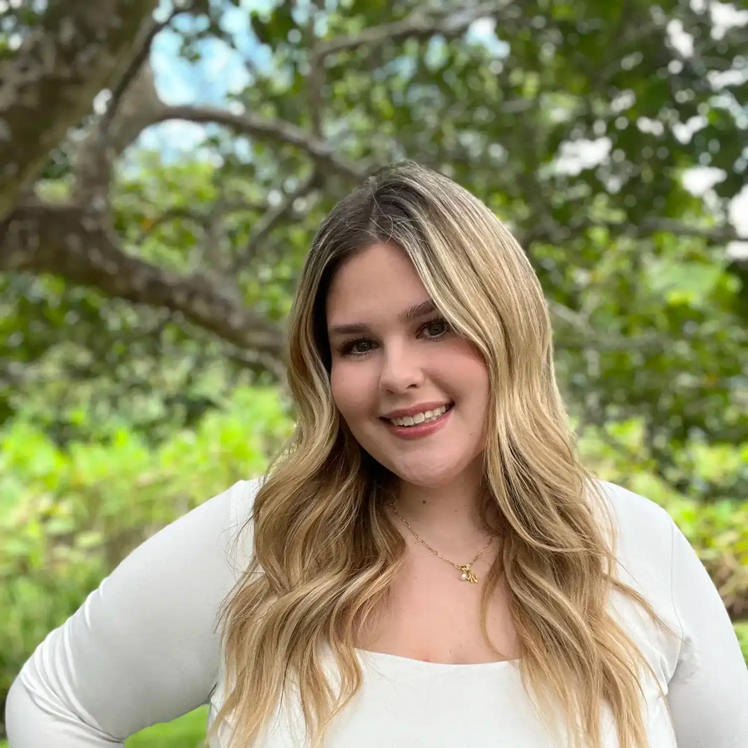 Portrait of Nora Jones, a professional stylist at Grey and Sage Salon, showcasing their expertise and style.